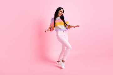 Fototapeta na wymiar Full length photo of young cheerful girl happy positive smile excited crazy dance party isolated over pastel color background