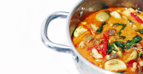 cooking curry Thai sup with vegetable and herb with chicken