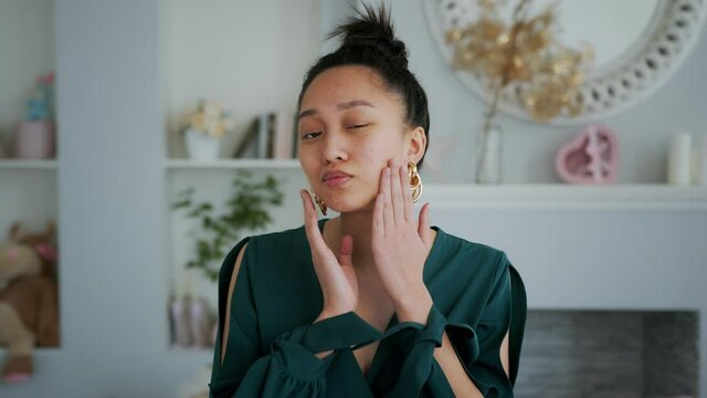 Young Asian Beautiful Girl with problem skin. Acne treatment stages - 22th day of 28. Commercial ready woman skin care concept.