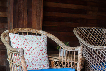 Fototapeta na wymiar empty rattan chairs. old chair furniture for decoration vintage style.