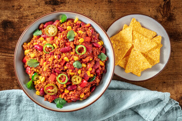 Chili con carne with nachos, overhead shot