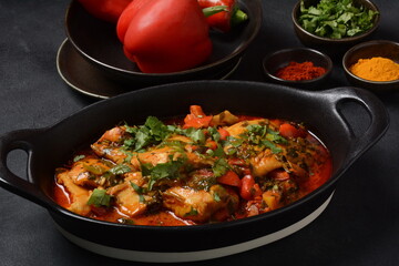 Moroccan fish  with chermoula, red peppers and preserved lemon. Spicy traditional  Moroccan food