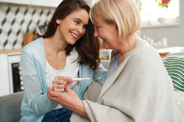 Woman shares the happy news with her mother