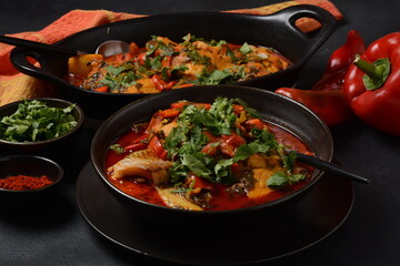 Moroccan fish  with chermoula, red peppers and preserved lemon. Spicy traditional  Moroccan food