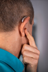 Fototapeta premium Hearing aid ear of man