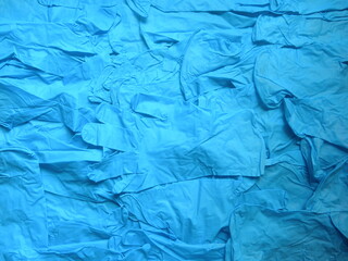 Pile of blue color disposable medical gloves