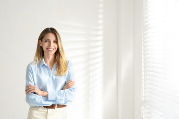 Portrait of beautiful young businesswoman in office