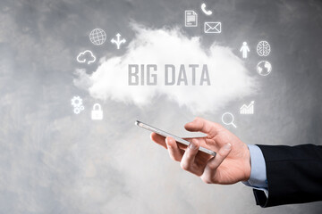 Businessman holds the inscription , word BIG DATA. Padlock , brain ,man, planet,graph, magnifier, gears, cloud, grid, document, letter, phone icon.