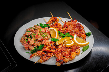Tiger shrimps wrapped in bacon with fresh tuna tartar