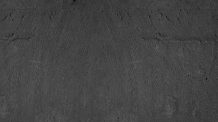 Dark black anthracite gray grunge stone concrete cement texture wall wallpaper background, with brush stroke