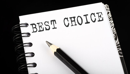 BEST CHOICE written text in a small notebook on a black background