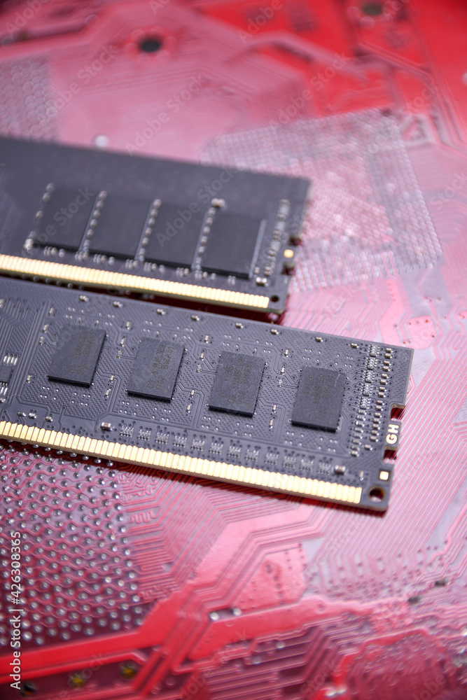 Poster Computer memory RAM on motherboard background . Close up. system, main memory, random access memory, onboard, computer detail. Computer components . DDR3. DDR4. DDR5
