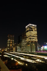 Fototapeta na wymiar Tokyo Station and skyscraper at night in Tokyo, Japan - 東京駅 夜景 日本