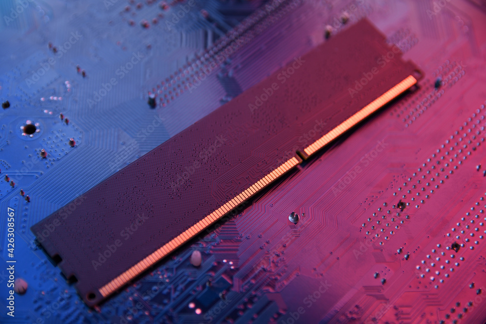 Poster Computer memory RAM on motherboard background . Close up. system, main memory, random access memory, onboard, computer detail. Computer components . DDR3. DDR4. DDR5