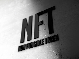 NFT black glossy text on metallic plate perspective
