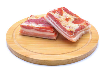 delicious homemade raw-smoked, cured bacon, lard, isolated on a white background.