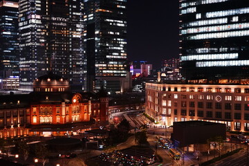 Fototapeta na wymiar Tokyo Station and skyscraper at night in Tokyo, Japan - 日本 東京 東京駅 夜景