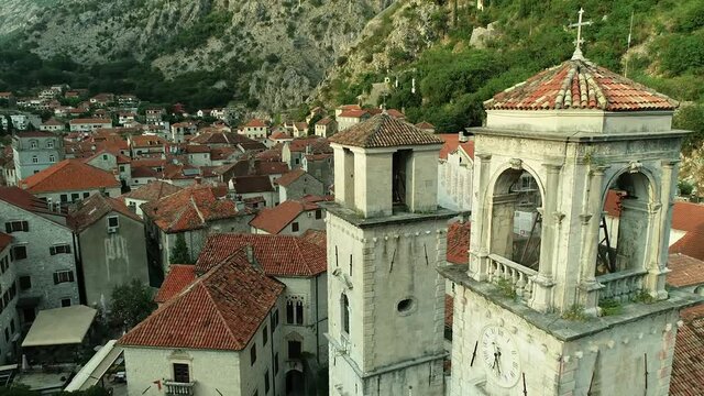 Kotor cathedral. Aerial shot around and towards sea Boka bay.