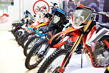 Motocross bikes in a sports store