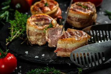 Cooking beef steak on grill served on black table for copy space text restaurant menu, top view