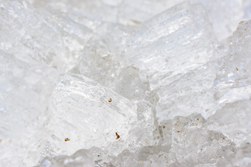 Unusual shapes and textures of ice crystals close-up shallow dof with copy space.