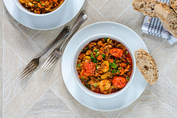 Chorizo, lentil and prawn stew
