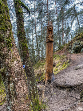 Wooden Sculpture of a fairy at the edge of the fairy path in Virton, Luxembourg, Belgium
