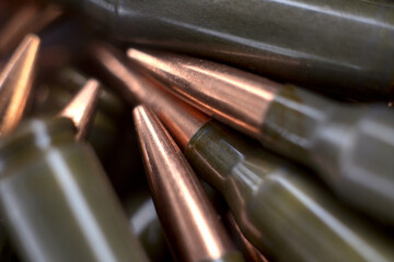 Live ammunition for automatic weapons or rifles ranked. Close-up view.