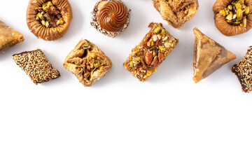 Assortment of Ramadan dessert baklava isolated on white background. Top view. Copy space
