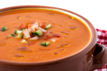 Gazpacho soup in crock pot isolated on white background.Close up