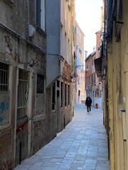 Fototapeta na wymiar Small street in Venice without any people during crisis COVID-19, Italy