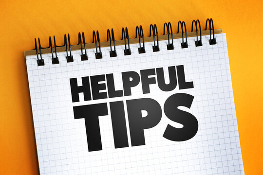 Helpful Tips text quote on notepad, concept background