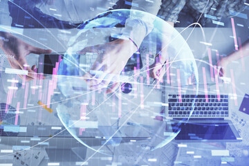 Double exposure of man and woman working together and financial chart hologram drawing. market analysis concept. Computer background. Top View.