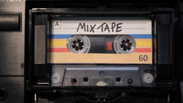 4K: Audio Cassette Mix Tape playing in Recorder - Vintage retro music. Stock Video Clip Footage