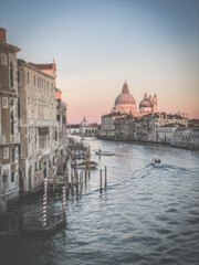 Fototapeta na wymiar View of the Grand Canal and Basilica Santa Maria della Salute from the Ponte dell'Accademia in Venice, Italy