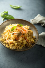 Spicy rice with shrimps and fresh basil