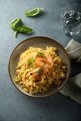 Spicy rice with shrimps and fresh basil