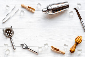 Set of cocktail drink tools and ingredients with shaker and ice. Flat lay