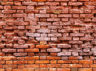 Horizontal part of a Venetian old red brick wall, background,