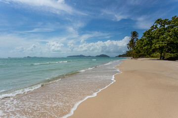 Sea view from tropical beach with sunny sky. Summer paradise beach of Koh Samui island. Tropical shore. Tropical sea in Thailand.