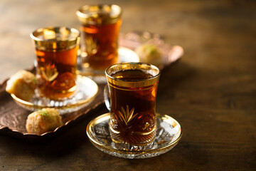 Traditional Turkish tea served with sweets