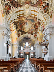 Obraz premium Innsbruck, Austria. Interior of Wilten Basilica. The rococo interior was created in 1751-1756 by Franz Xaver Feuchtmayer, Anton Gigl and Matthaus Gunther. The organ was built in 1894.