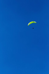 paragliding in the blue sky