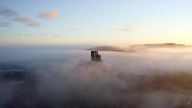 Corfe Castle very foggy sunrise