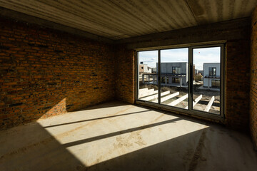 Room without finishing. New project in the new house. Construction and rental of offices.