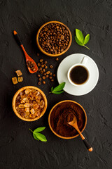 Black coffee espresso with coffee beans, top view