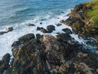 Fototapeta na wymiar Aerial view of rocky coastline in the morning.