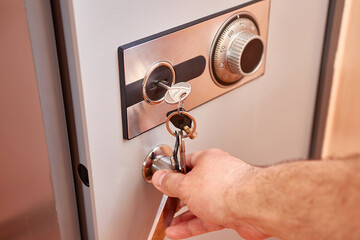 Security of finances and documents. Opening a coded safe.
