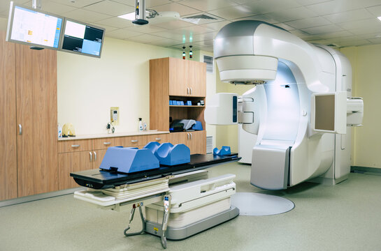 Photo of medical an advanced linear accelerator in the therapeutic oncology cancer therapy in the modern hospital laboratory