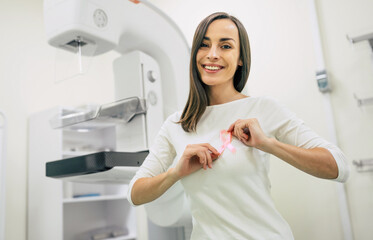 Young woman is having mammography examination at the hospital or private clinic with a professional female doctor. - obrazy, fototapety, plakaty